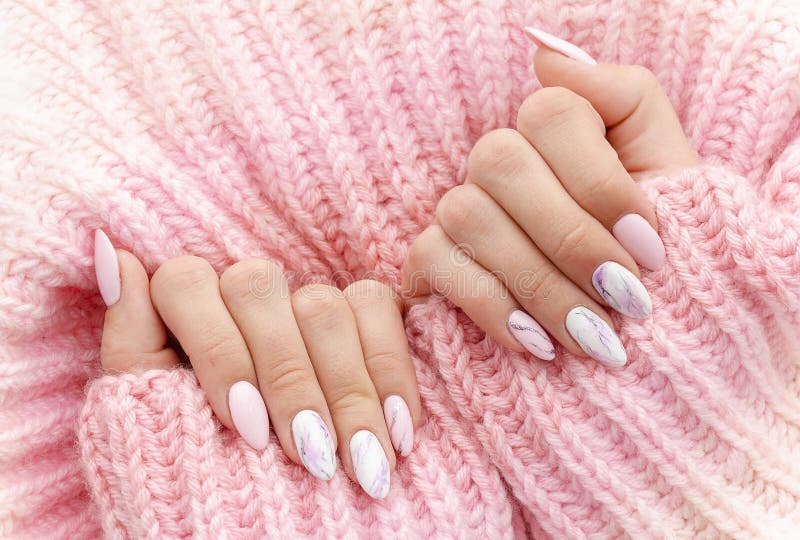 female-hands-manicure-close-up-view-pink-knitted-sweater-background-nail-painting-effects-manicure-salon-banner-concept-female-146396808
